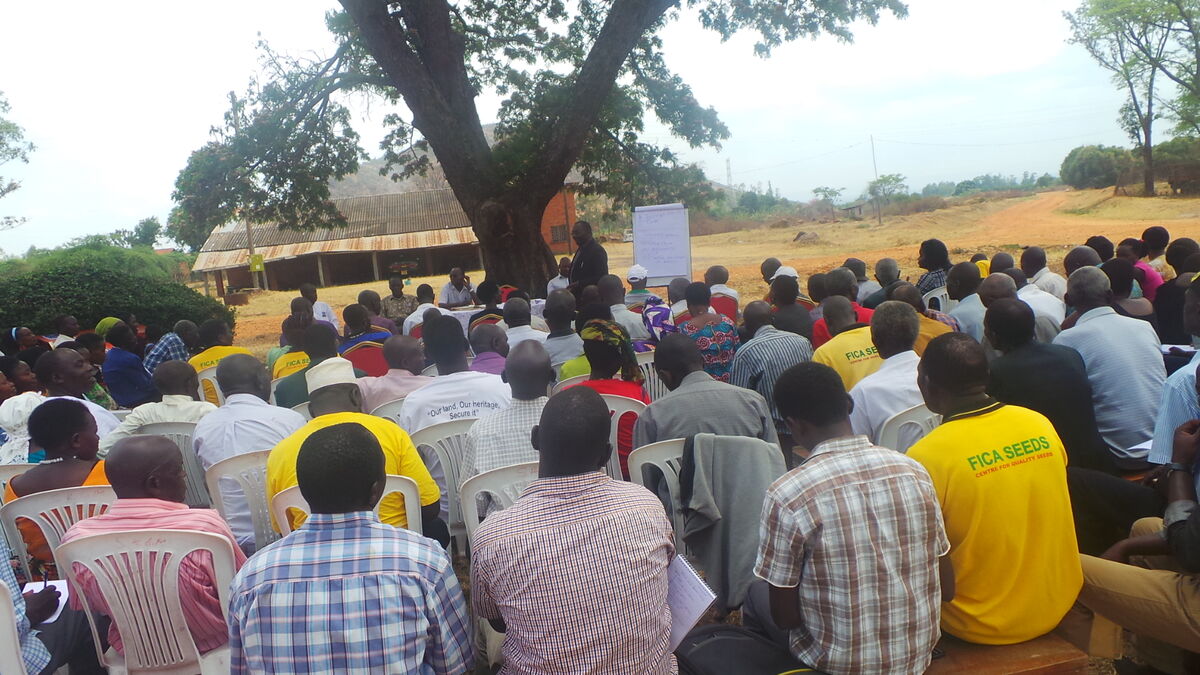 CEO training farmers in Kasese